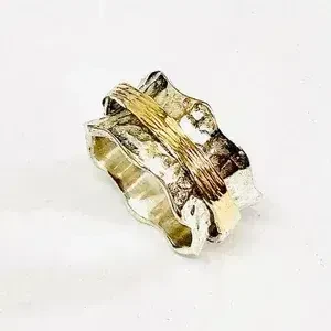 Explore the Artistry and Symbolism of Silver Statement Rings