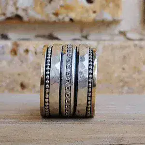 Gold and Silver Spinner Ring With Zircon Stones