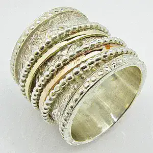 Unique statement gold and silver spinner ring