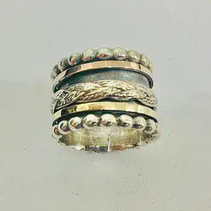 Bohemian Spinner Ring Decorated With Silver And Gold Bands